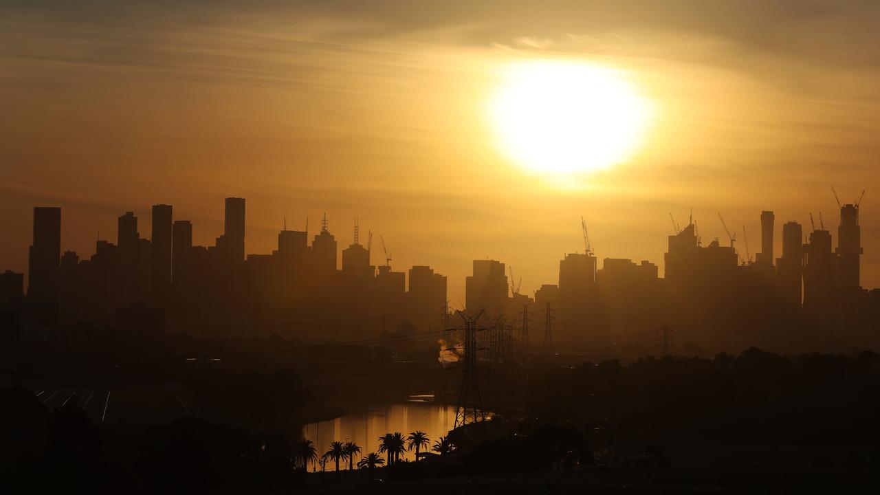 The sun rises over Melbourne