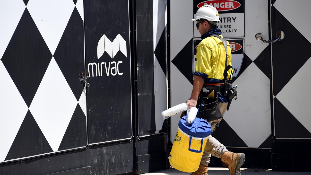 A worker enters a Mirvac construction site (file image)