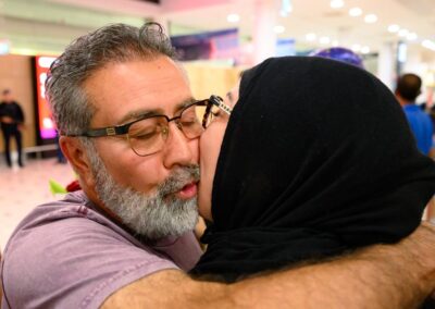 War-trapped Aussies arrive home on first Dubai flight