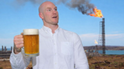 David Pocock with beer at gas facility