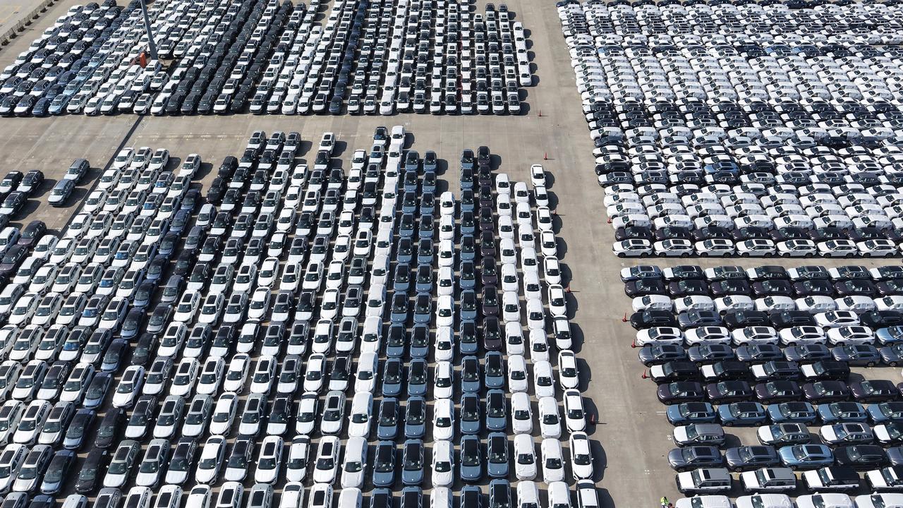 Cars awaiting export to overseas markets at a port in Shanghai, China