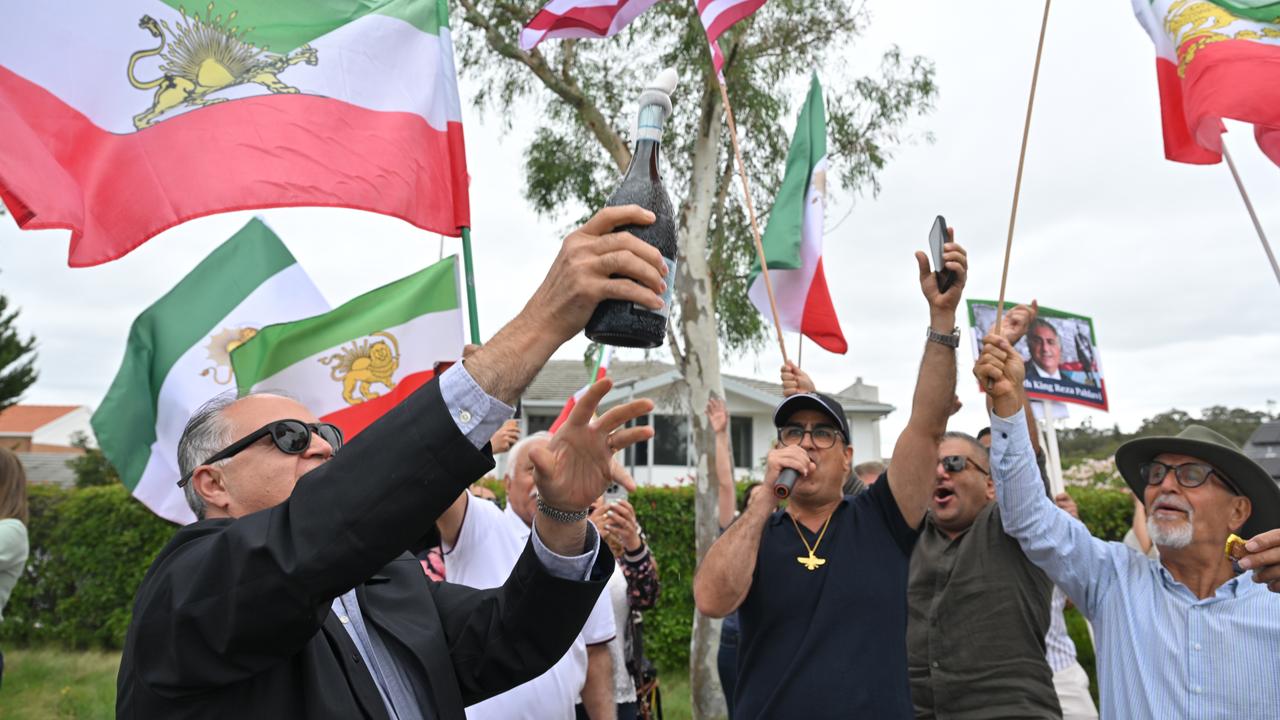 Iranian Australians celebrate outside Iran's embassy,
