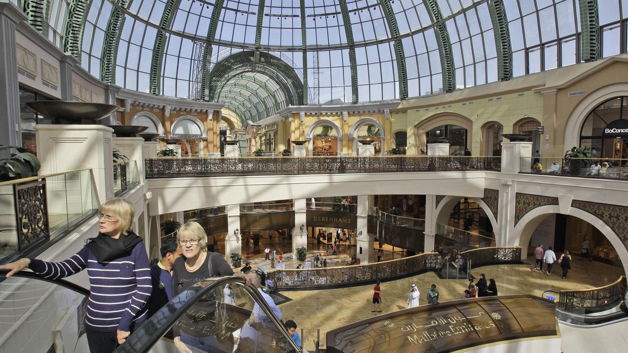 Tourists visit a shopping mall in Dubai, United Arab Emirates