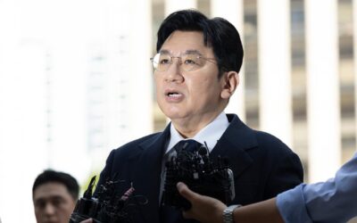 SKorea cops seek arrest warrant for BTS agency founder