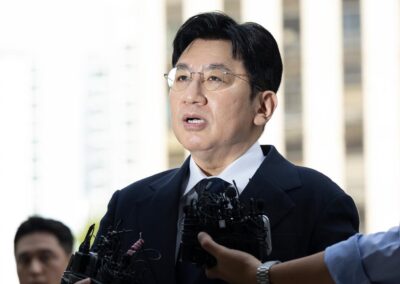 SKorea cops seek arrest warrant for BTS agency founder