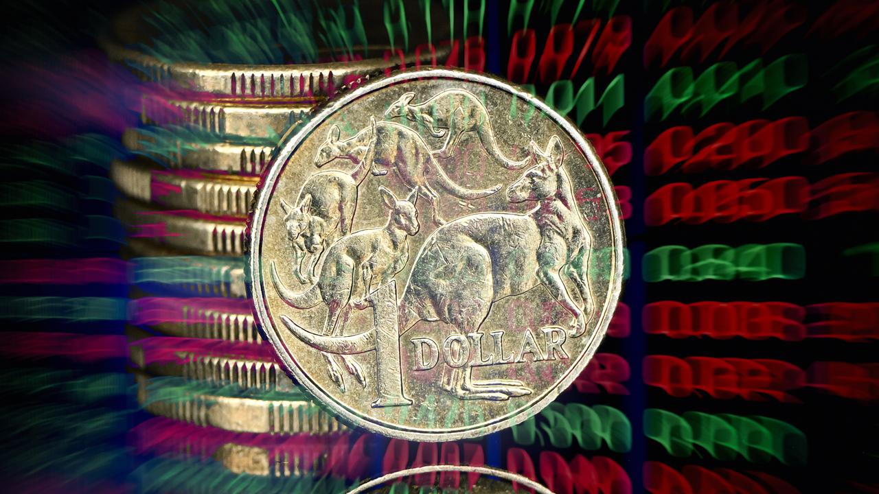 An ASX board and Australian dollar coin (file image)