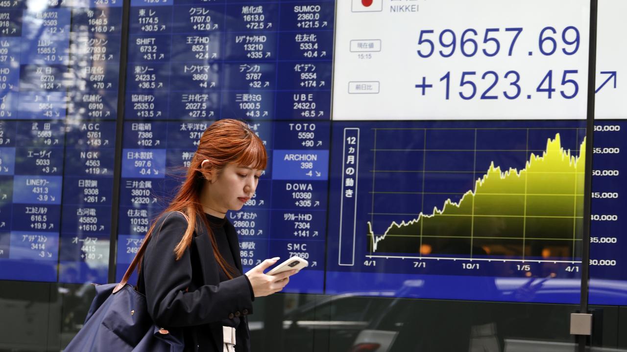 Asia shares track Wall Street to record highs