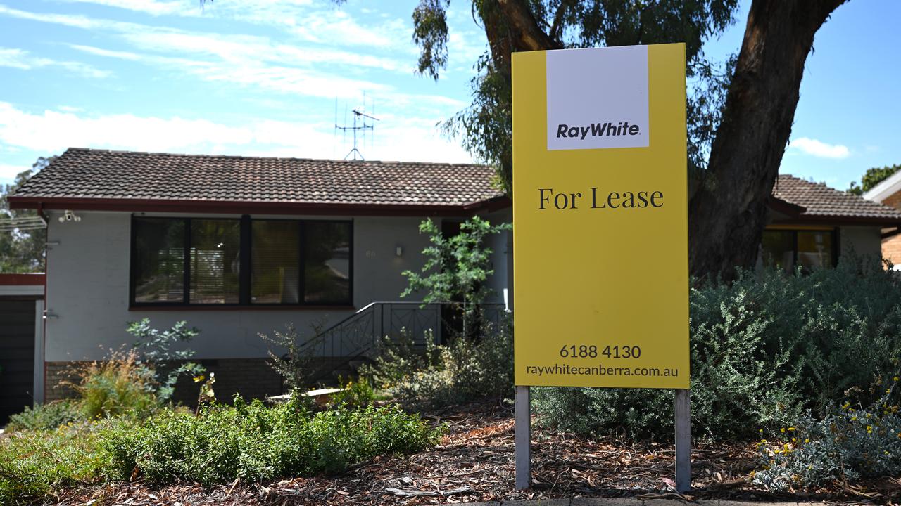 A 'For Lease' sign is seen outside a house
