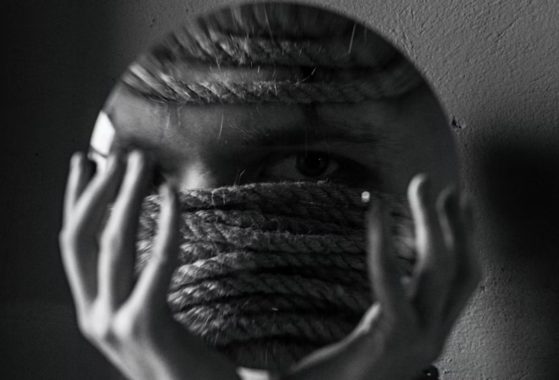 Muzzled, tied up. Image: Sergey Vinogradov, Unsplash