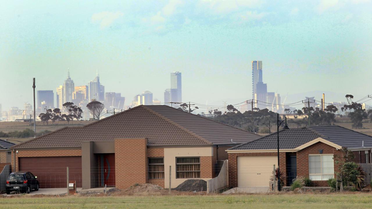 Melbourne's city skyline from a housing estate at Deer Park