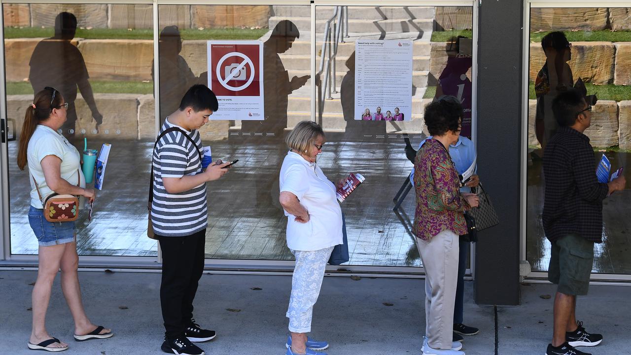 Voters are seen at William Duncan State School in Nerang, Qld