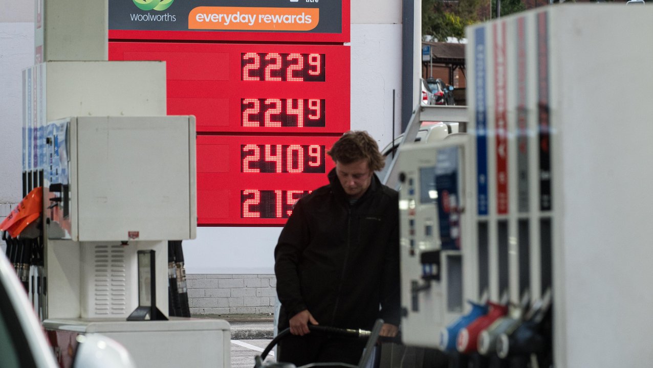 A man filling up at a petrol station in Sydney