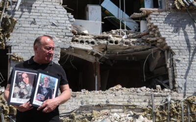 Forensic experts sift through drone hit dormitory