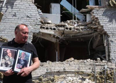 Forensic experts sift through drone hit dormitory