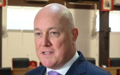 NZ to trim new spending and stick to surplus path