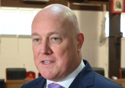NZ to trim new spending and stick to surplus path