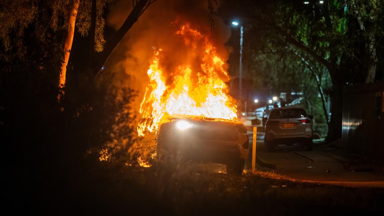 A burning police car 