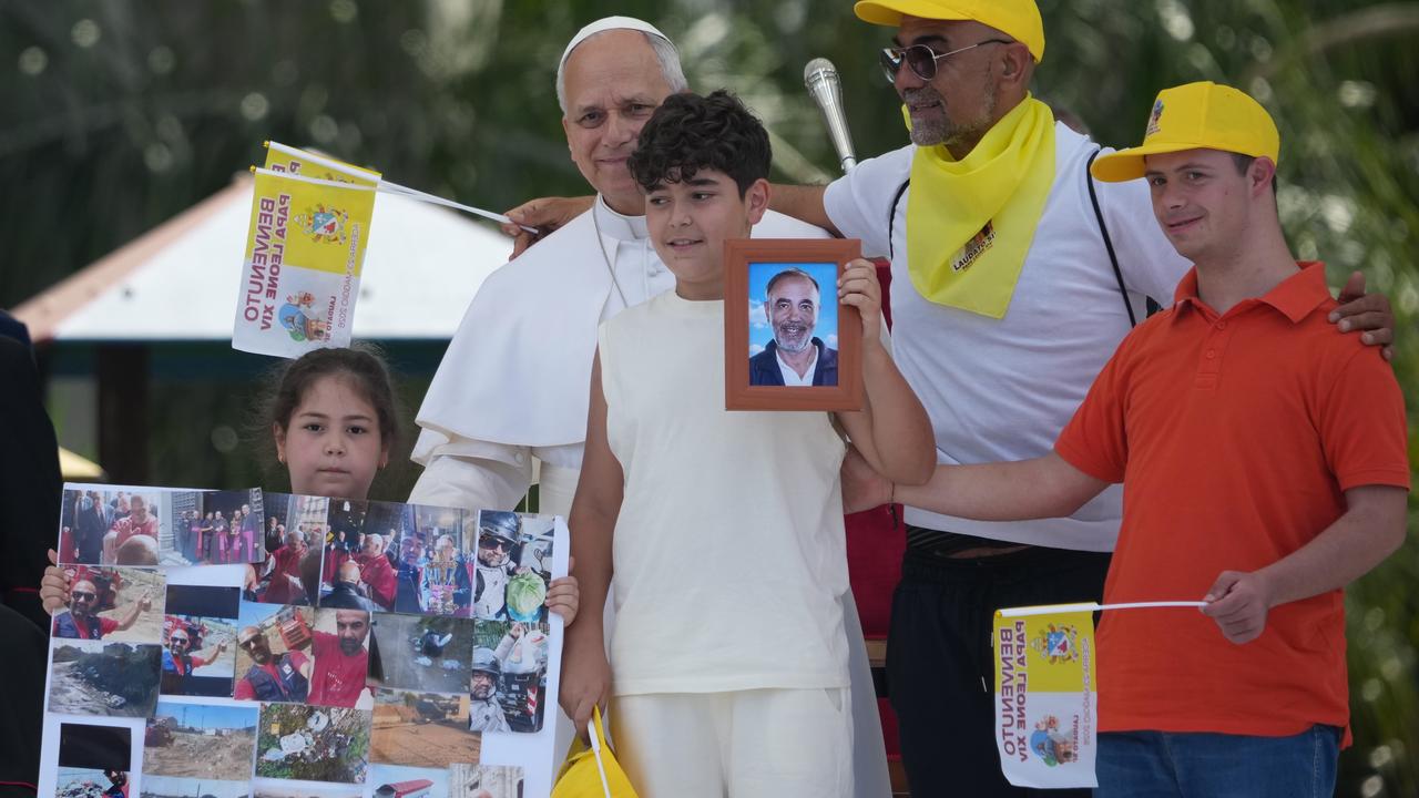 Pope Leo with families of dead victims