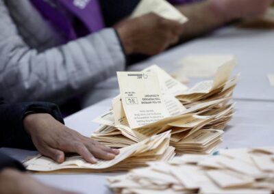 Neck and neck by-election could swing on postal votes