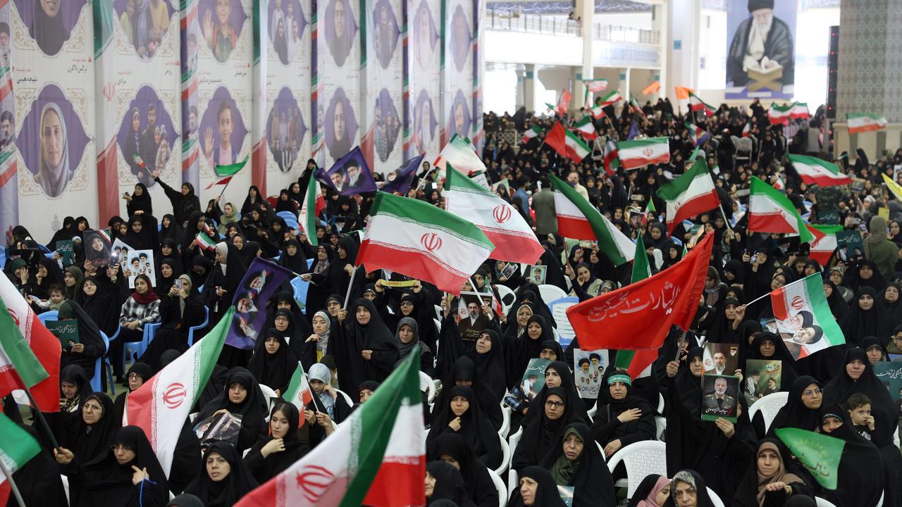 Iranian women waving flags