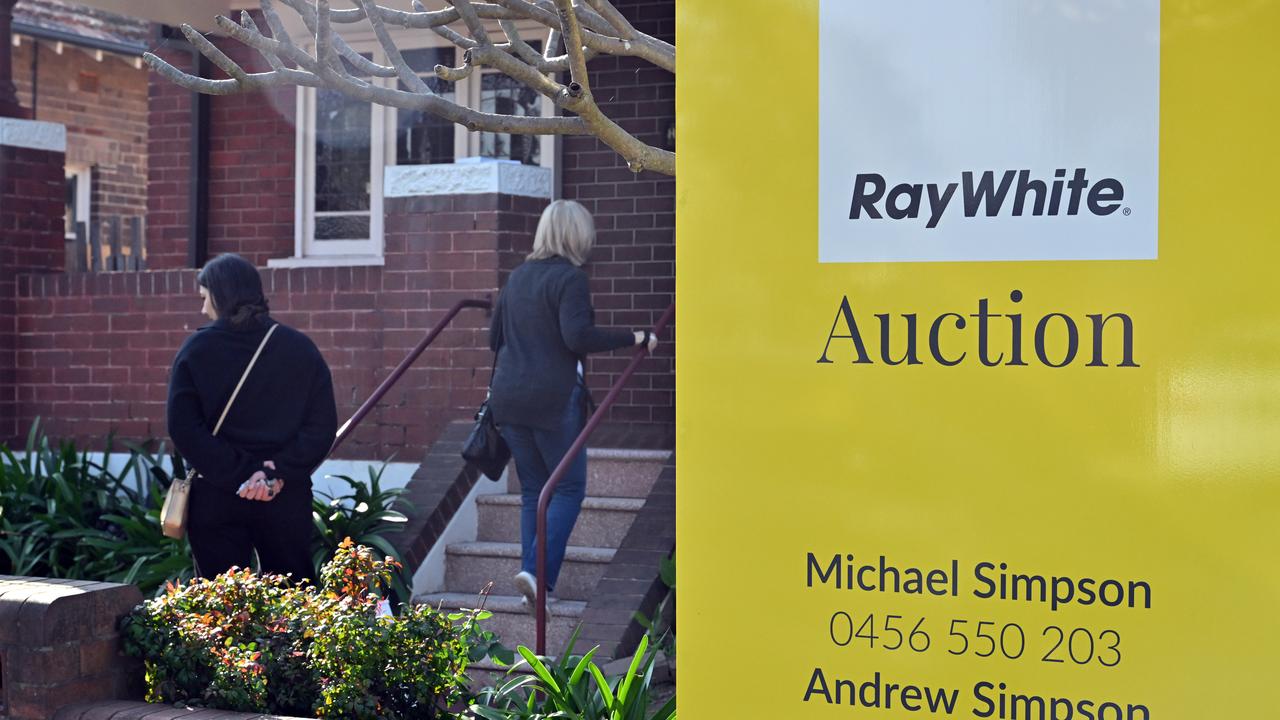 Auction sign outside house