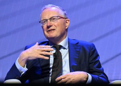 Treasurer responds after budget attack by ex-RBA head