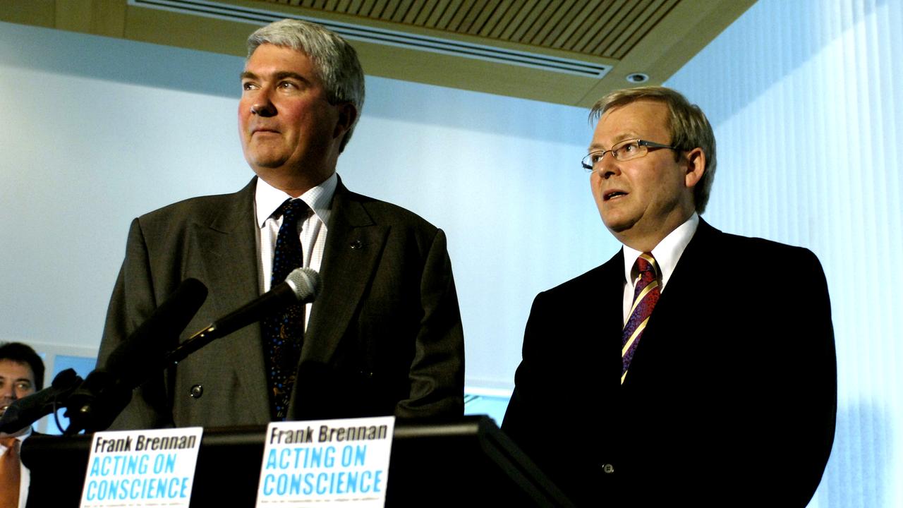 Frank Brennan and Kevin Rudd (file image)