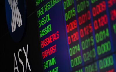Australian shares edge lower as miners weigh