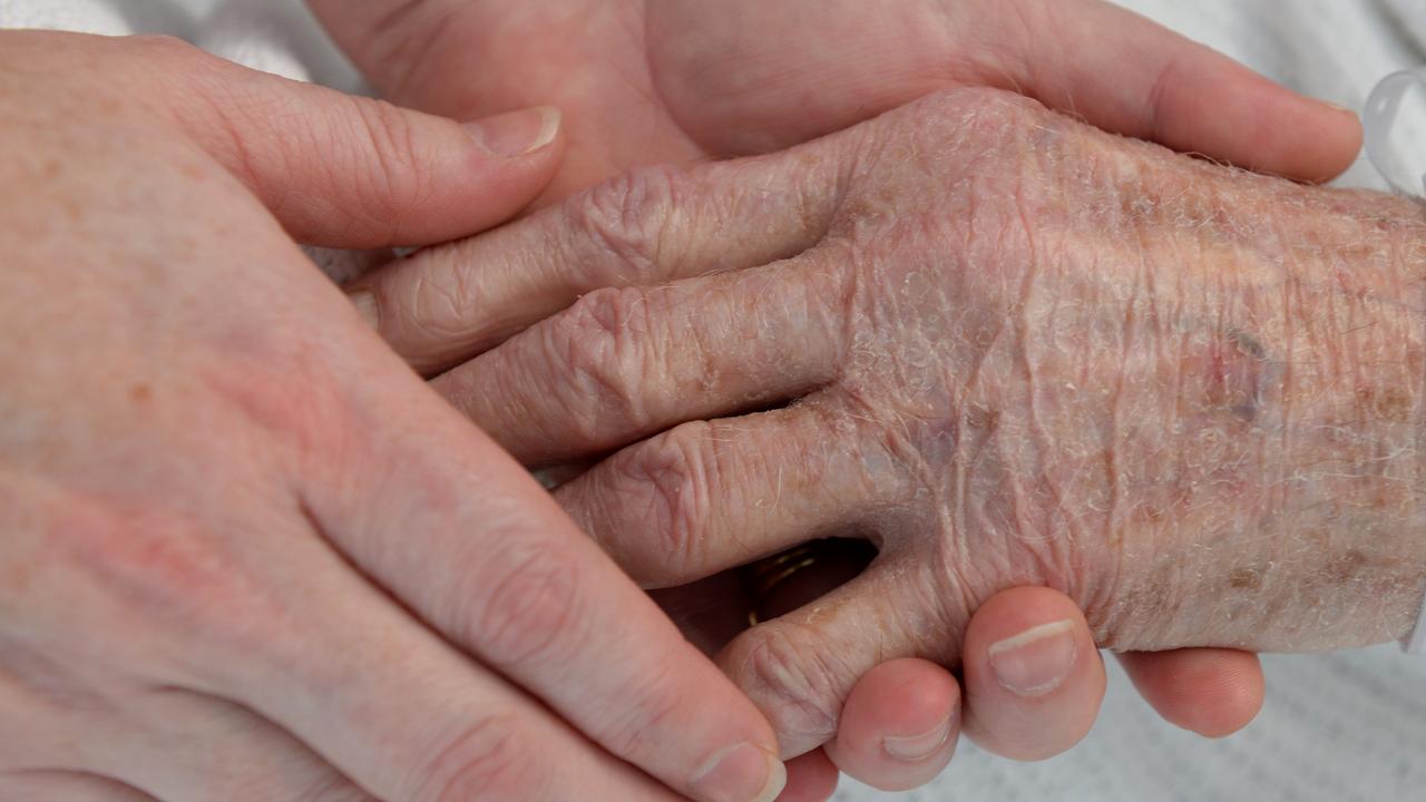 People holding hands (file image)