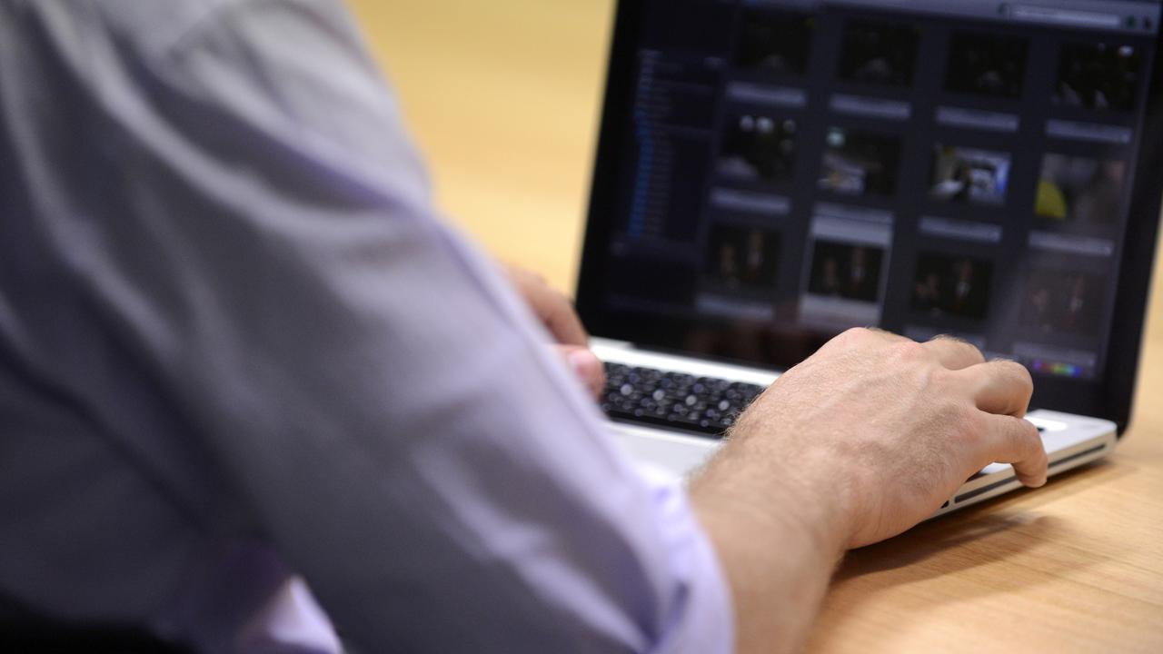Man uses laptop