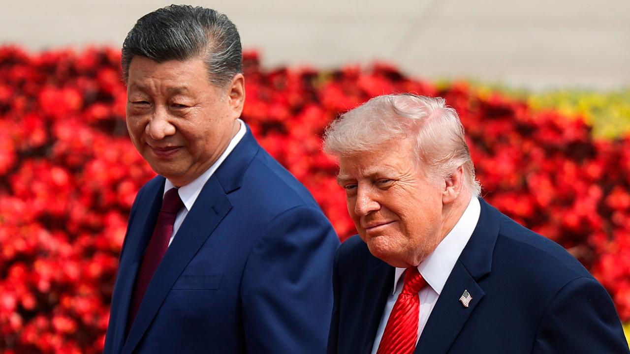 Xi Jinping and Donald Trump during Trump's visit to Beijing in May
