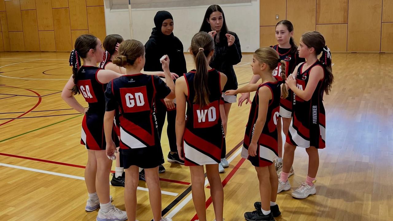Fawkner Netball club team huddle