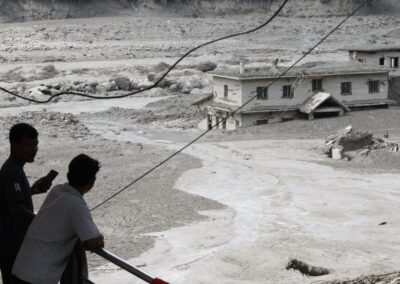 Urgent search for Australians missing in flash floods
