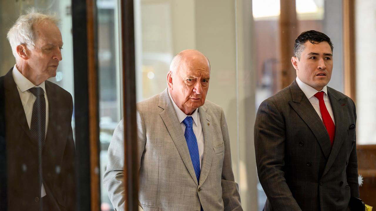 Alan Jones with lawyers