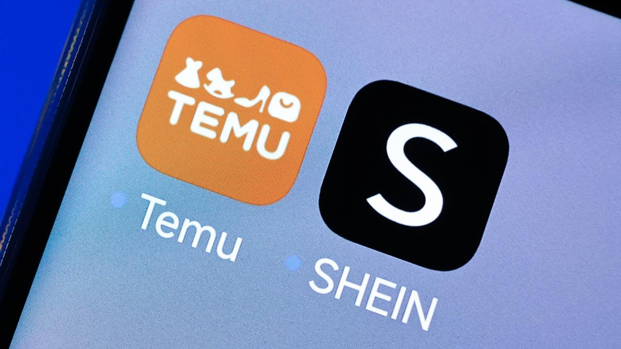 Temu and Shein app icons on a smartphone 