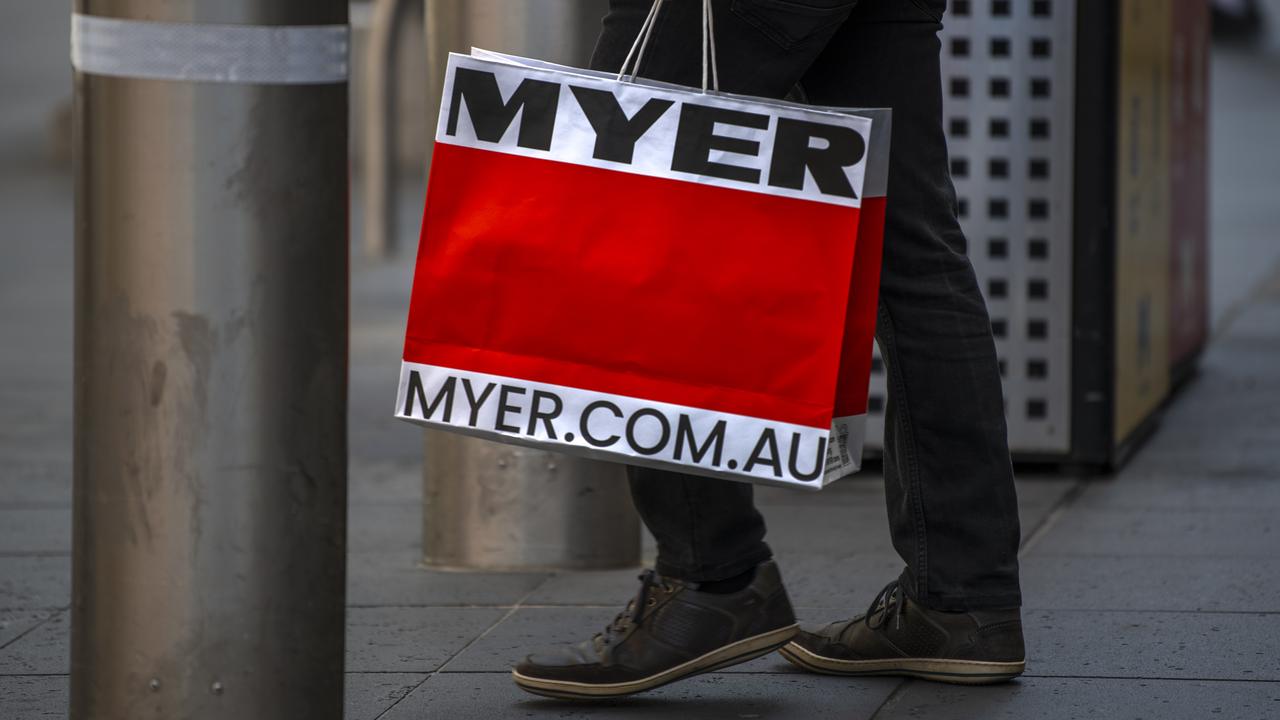 someone holding a Myer bag