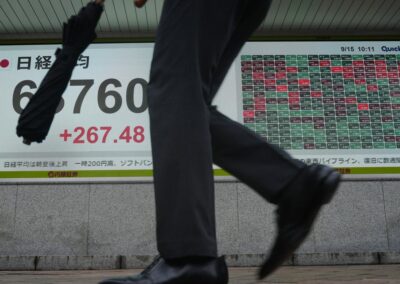 Shares tick higher as Fed hikes rates, dollar jumps