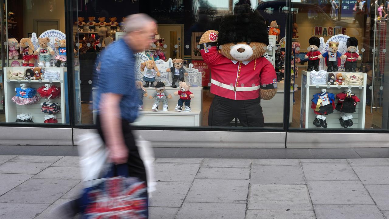 A shopper walks in Oxford Street, in London