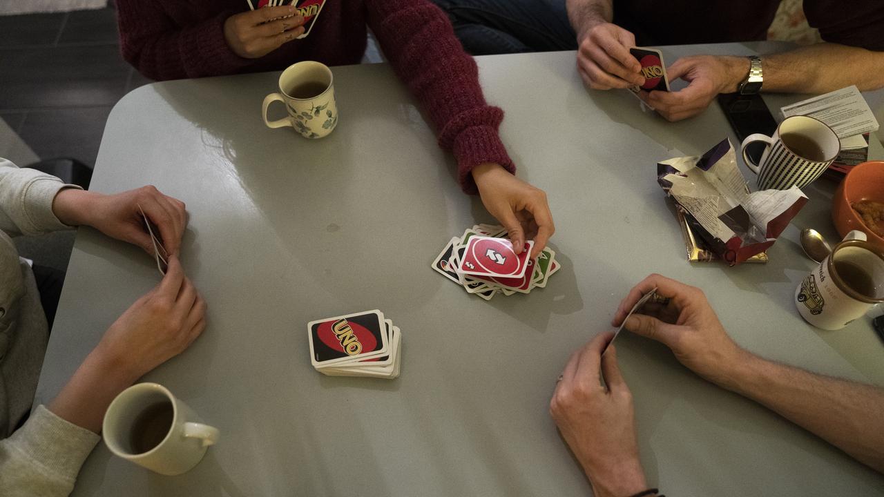 People playing Uno