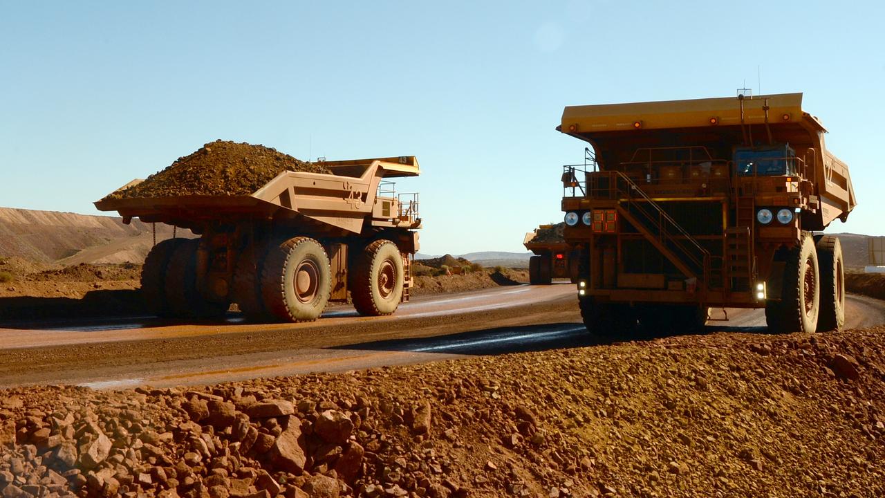 Haulage trucks at an iron ore mine in the Pilbara region