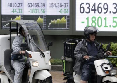 Asia shares fall after wild swings in bonds