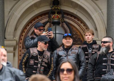 Riders rally over potholes as land tax cut locked in