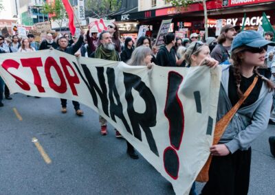 Protesters rally outside controversial weapons expo