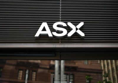 Australian shares trade flat, shrugging off US records