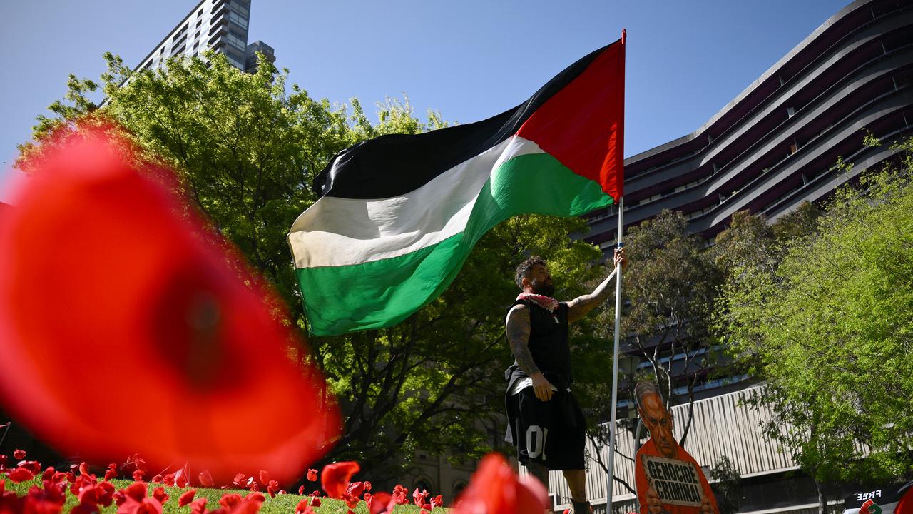 Pro-Palestine protesters hold a vigil for Gaza
