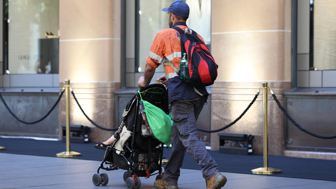 Man pushing a pram