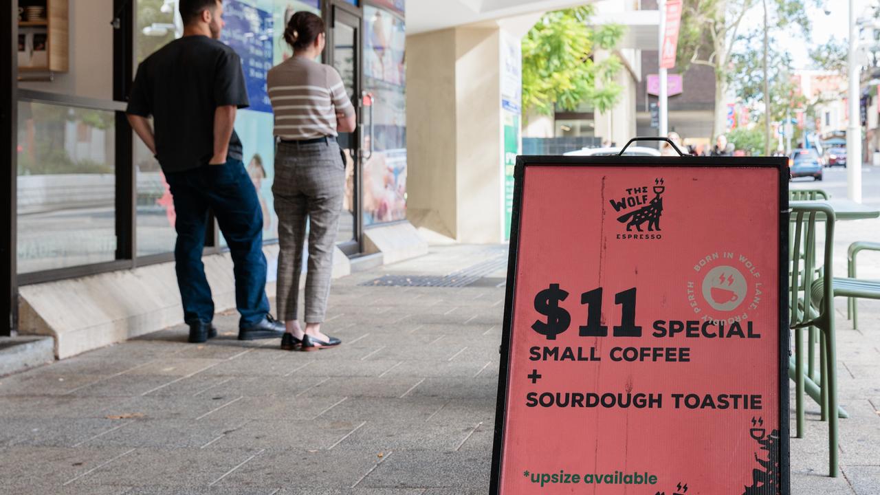 A sign advertising coffee