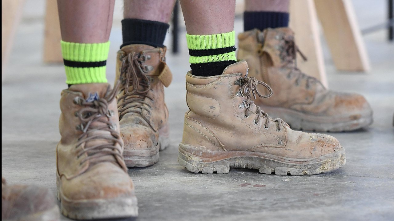 Apprentices wearing work boots