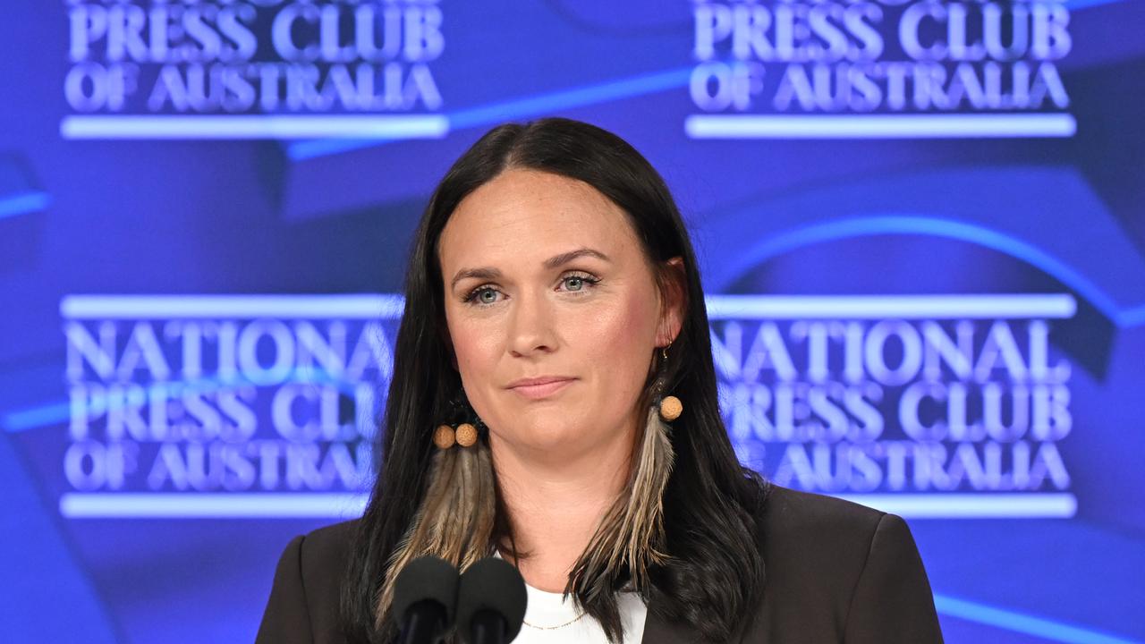 woman at lecturn of National Press Club