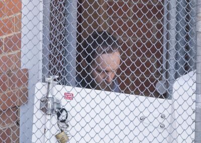 Silent, staring: alleged MP attacker appears in court